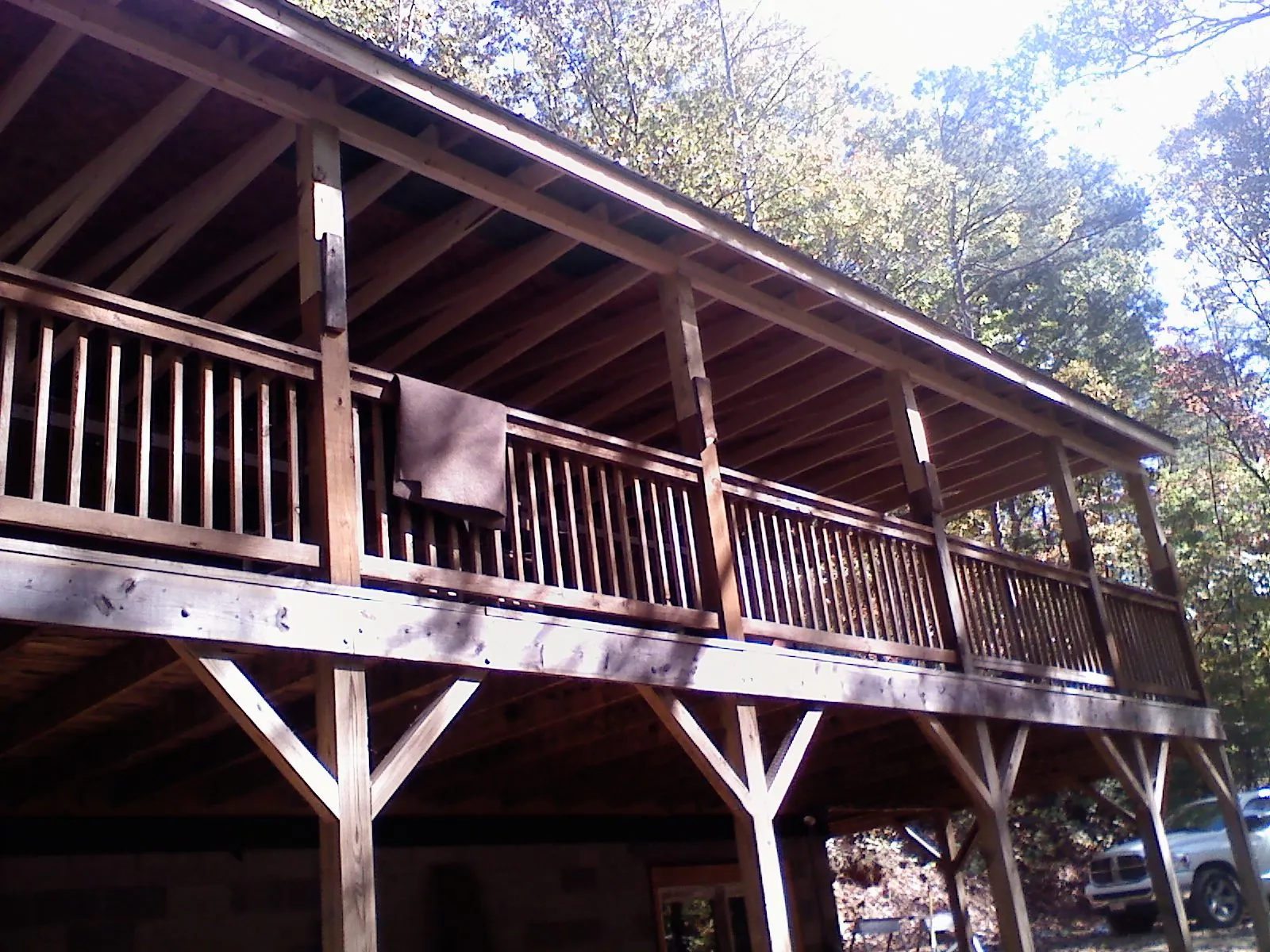 Timber framing under a new elevated porch and deck — Roof Leak Repair in Jemez Pueblo by Roofing Brothers